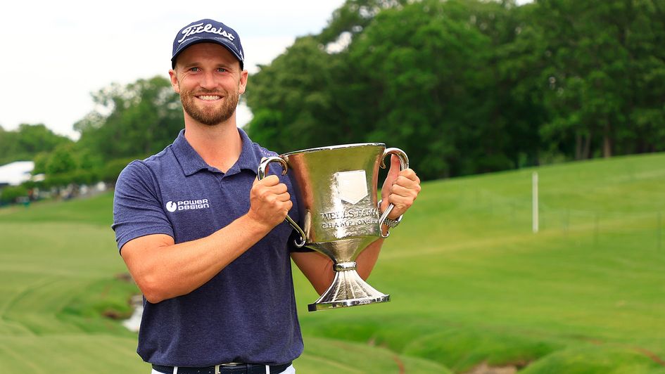 Wyndham Clark celebrates with the trophy