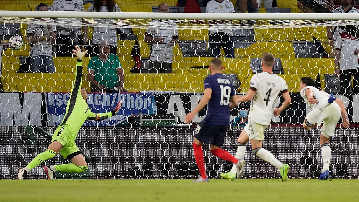 Mats Hummels diverts the ball into his own net against France