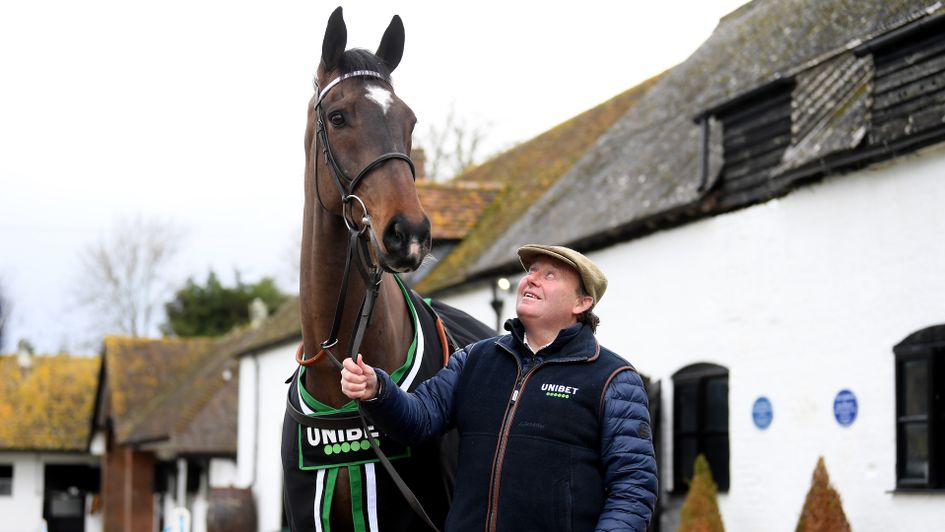 Santini towers above trainer Nicky Henderson