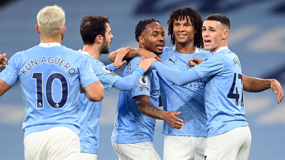 Manchester City celebrate Raheem Sterling's goal against Arsenal