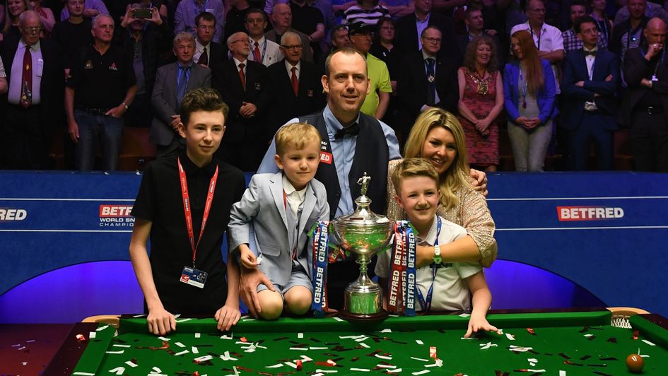 Mark Williams celebrates his world title triumph