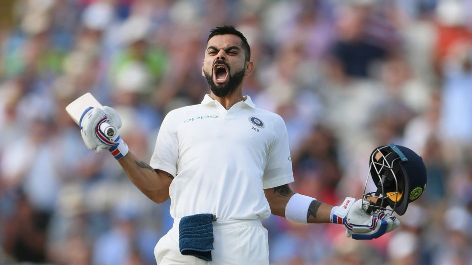 Virat Kohli celebrates reaching three figures