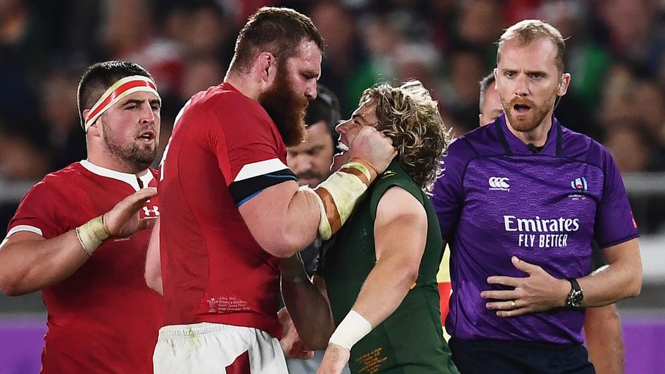 An iconic World Cup moment: 5.7ft Faf de Klerk, right, versus 6.5ft Jake Ball in the semi-final