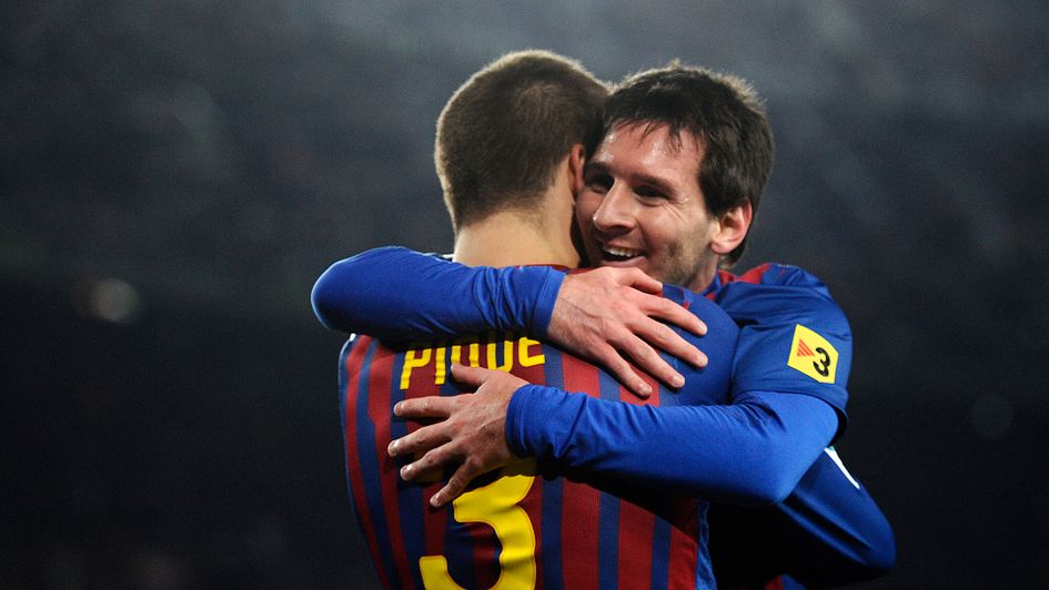 Gerard Pique and Lionel Messi