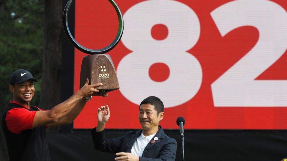 History maker: Tiger Woods celebrate his 82nd PGA Tour title after victory in Japan
