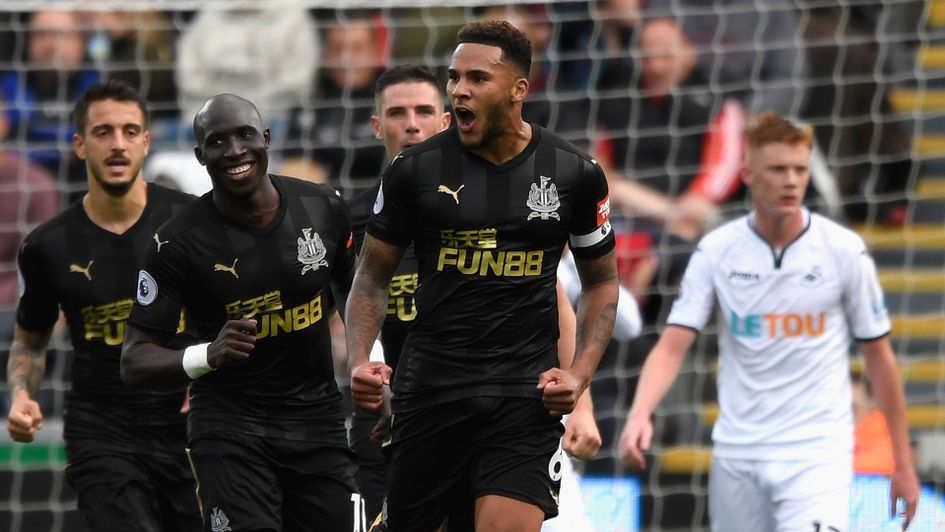 Newcastle captain Jamaal Lascelles celebrates