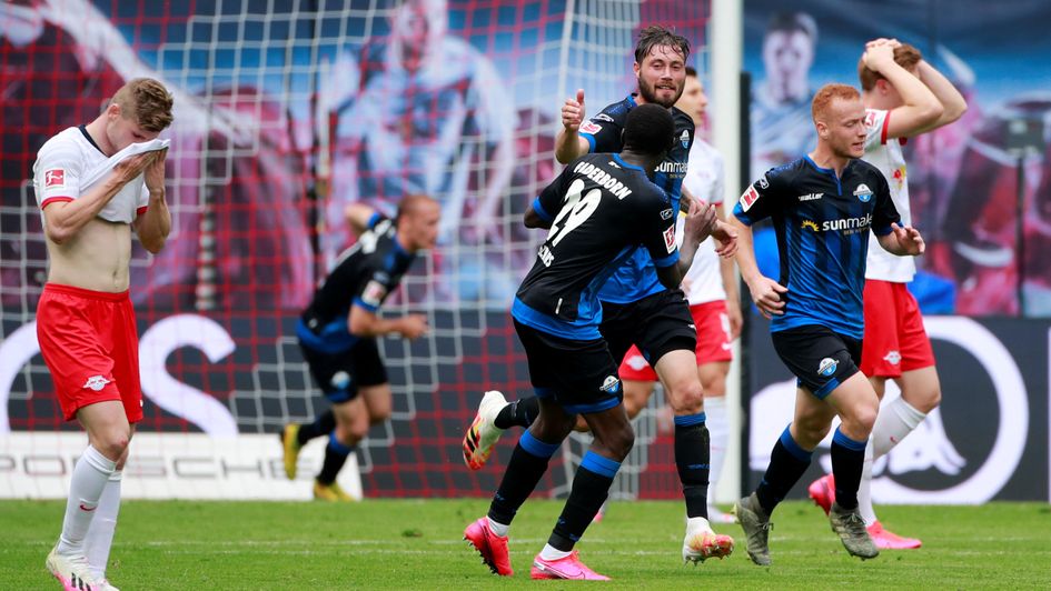 Celebrations for Christian Strohdiek and Paderborn after their late equaliser against RB Leipzig