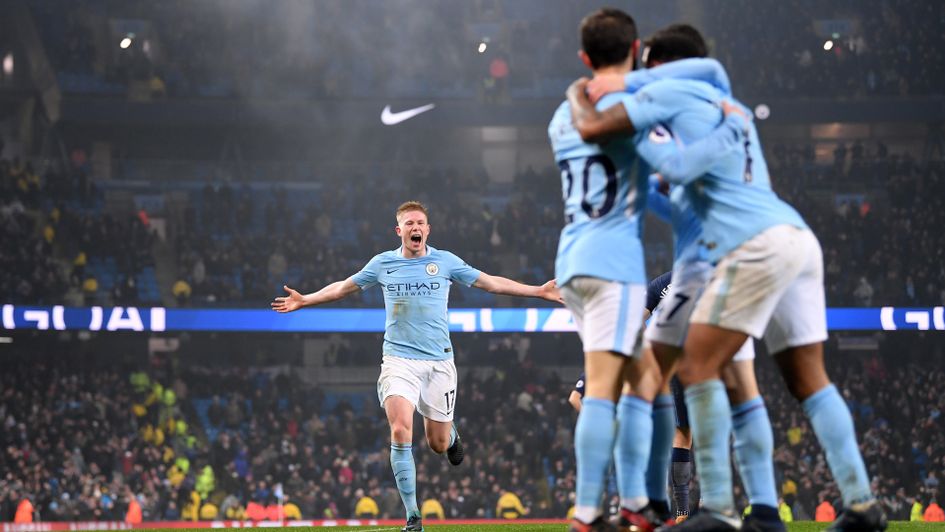 Kevin De Bruyne celebrates with team-mates
