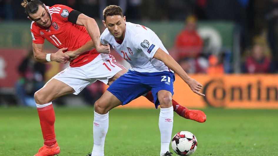 Nemanja Matic battles Gareth Bale for possession