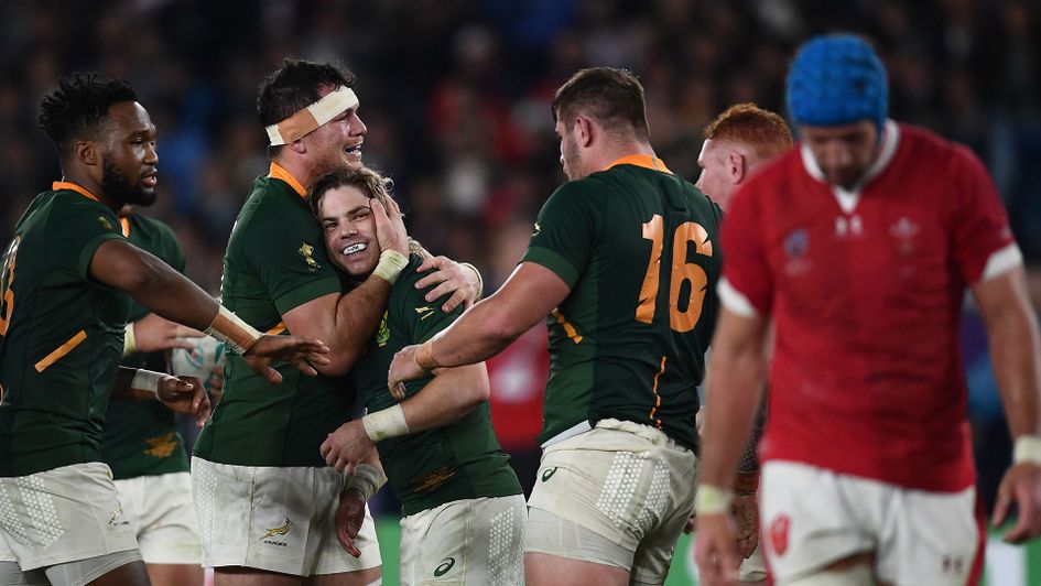 South Africa celebrate their narrow Rugby World Cup semi-final victory over Wales