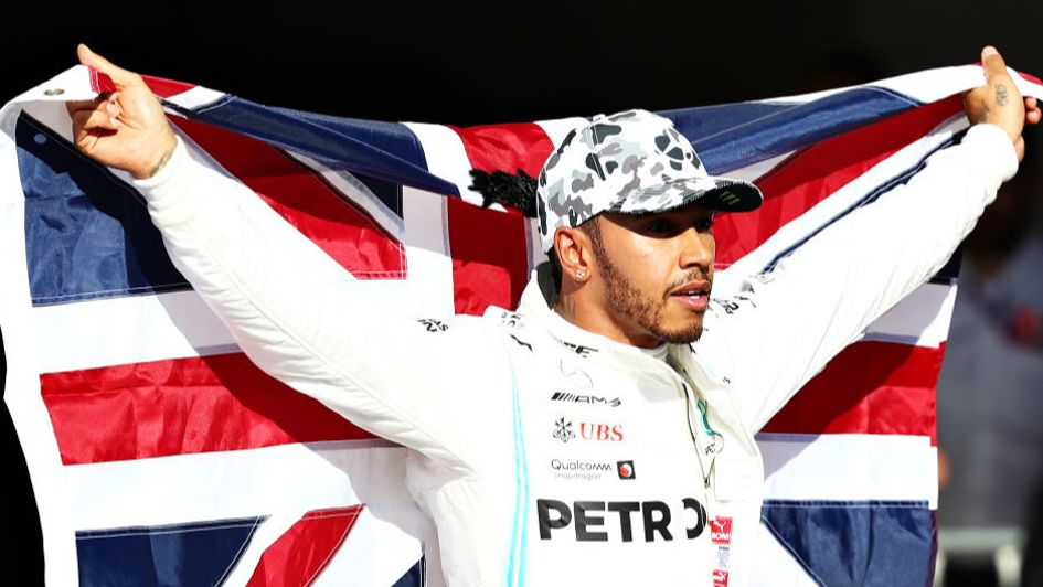 Lewis Hamilton celebrates his sixth world title