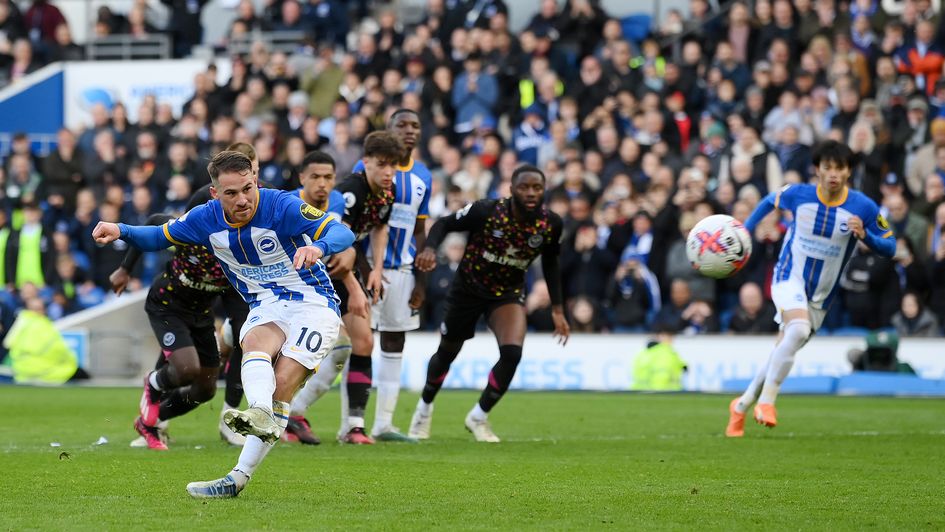 Alexis Mac Allister scores his penalty against Brentford