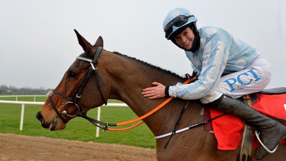 Rachael Blackmore gives Honeysuckle a pat down the neck