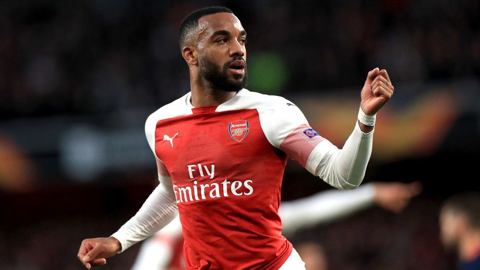 Lacazette celebrates against Valencia