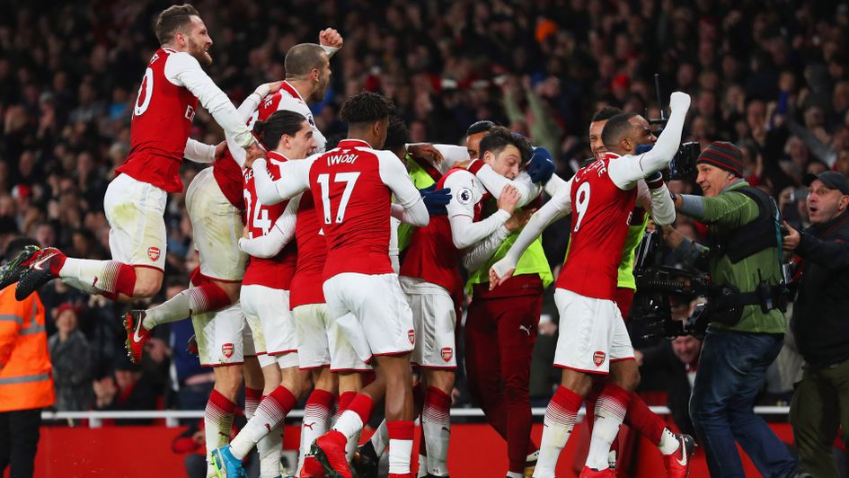 Arsenal celebrate Mesut Ozil's goal