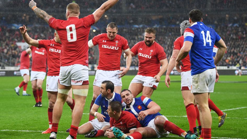 Celebrations for Wales as Liam Williams crosses the line against France in the Six Nations