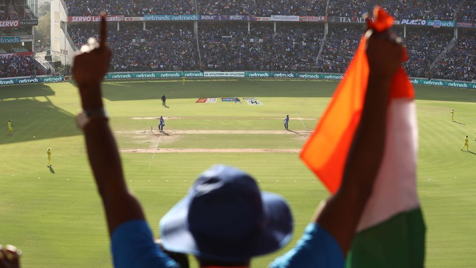 An India supporter hails another Virat Kohli century