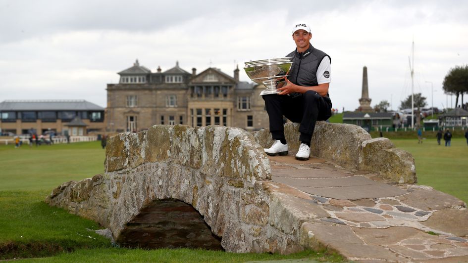 Victor Perez of France poses with the trophy