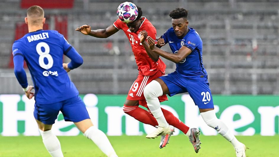 Alphonso Davies and Callum Hudson-Odoi battle for the ball