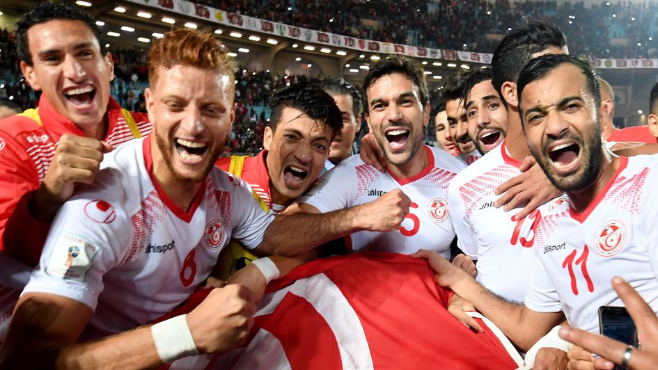 Tunisia players celebrate after qualifying for the World Cup