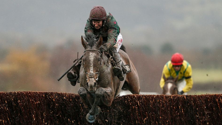 A mud-splattered Adrian Heskin and Mister Whitaker in action