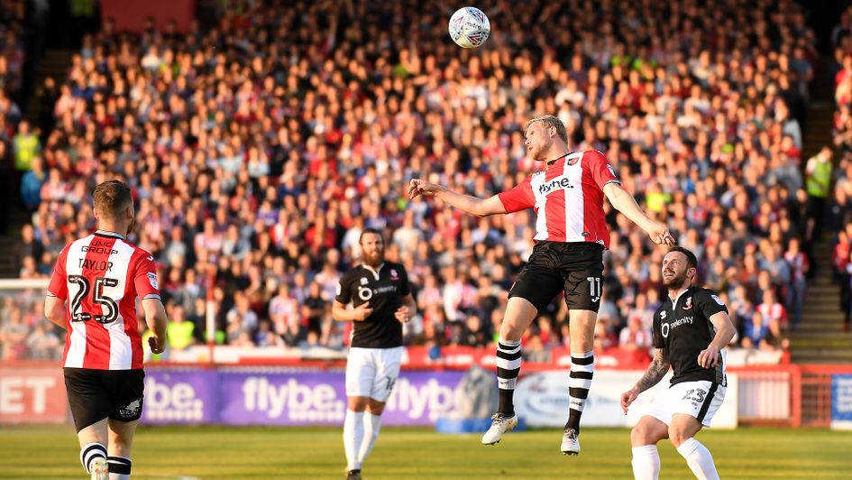 Jayden Stockley (second right) has switched Exeter for Preston