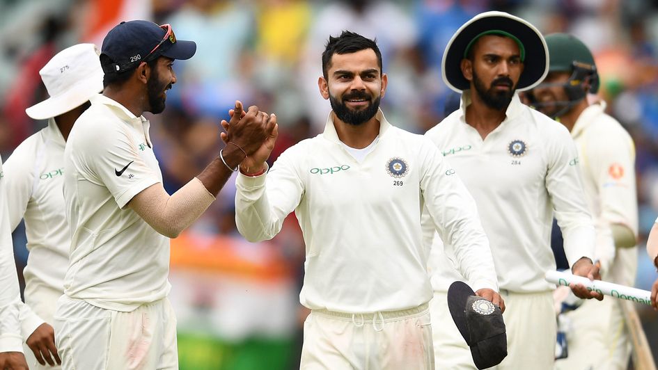 India celebrate their victory in Adeliade