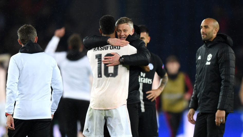 Ole Gunnar Solskjaer embraces Marcus Rashford after an incredible night
