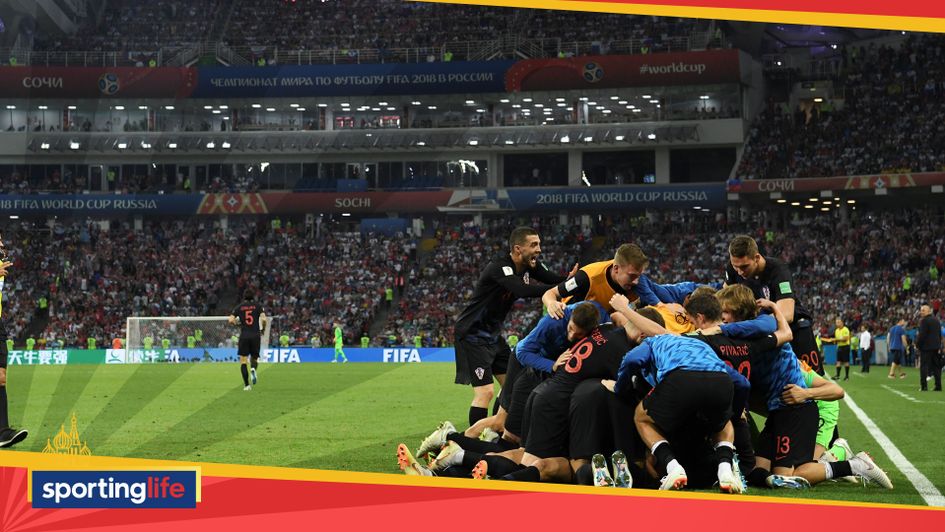 Croatia players celebrate after Domagoj Vida's extra-time goal v Russia