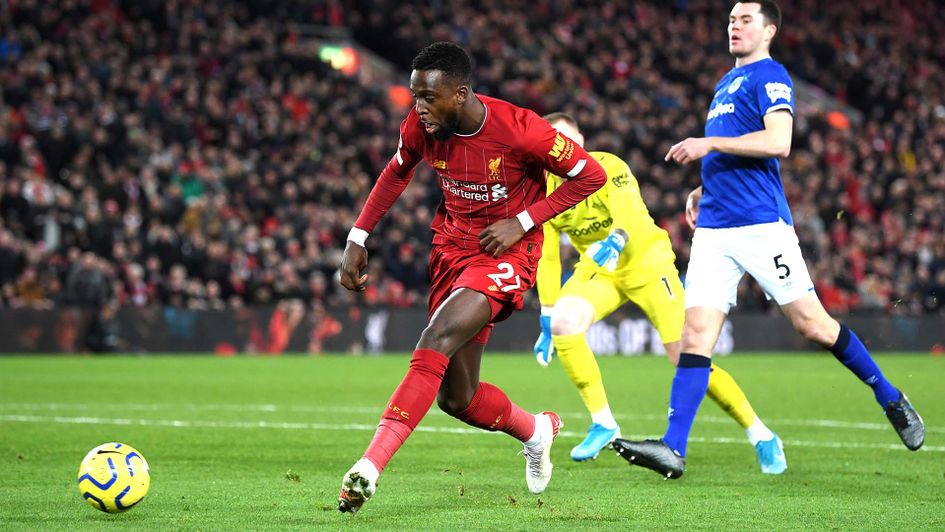 Divock Origi scores for Liverpool against Everton in the Merseyside derby