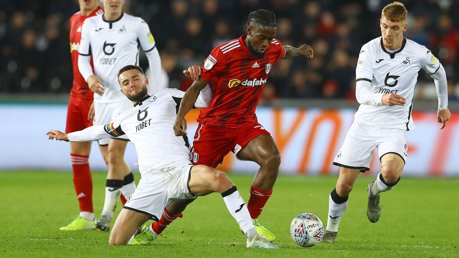 Matt Grimes makes a tackle