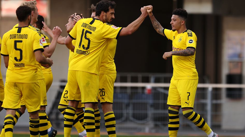 Jadon Sancho celebrates one of three goals in Borussia Dortmund's 6-1 demolition of Paderborn