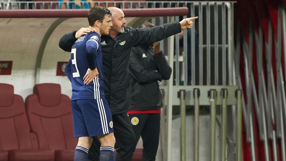 Scotland boss Steve Clarke (right) gives instructions to captain Andrew Robertson