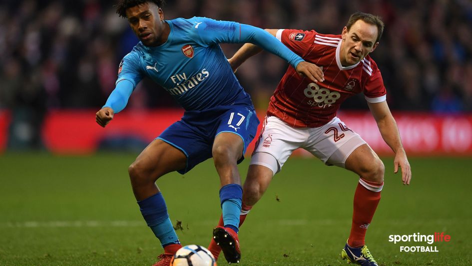 David Vaughan (right) in action against Arsenal