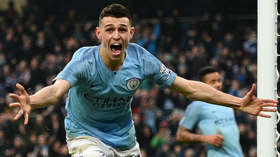 Phil Foden celebrates after scoring against Rotherham