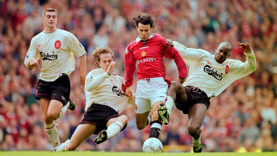 Jason McAteer and Michael Thomas look to stop Ryan Giggs