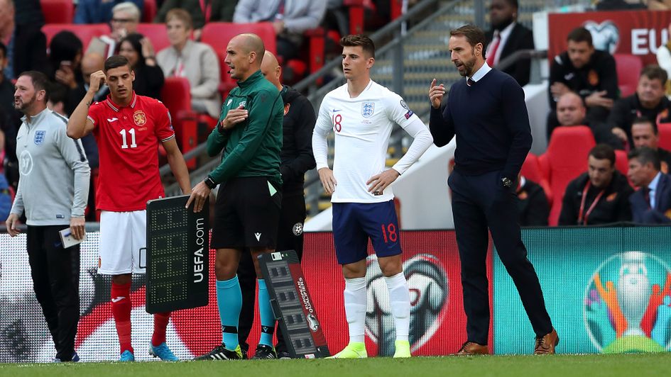 Mason Mount receives instructions from Gareth Southgate