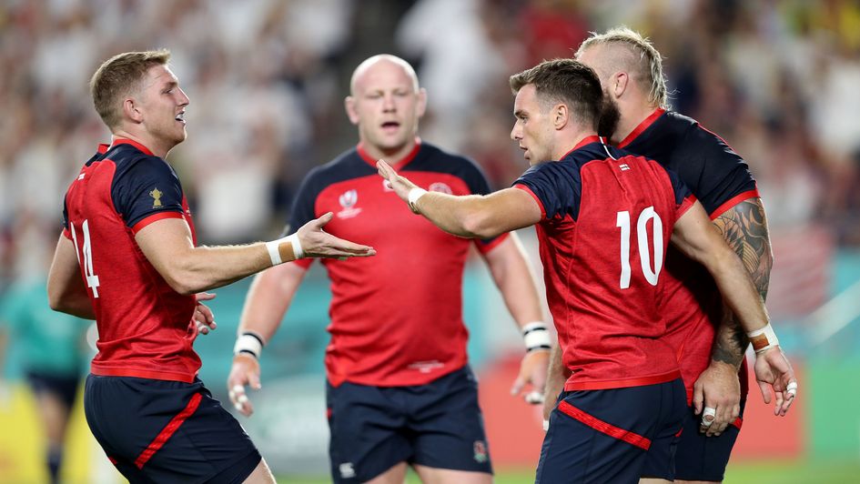 England's George Ford (10) celebrates scoring his side's opening try