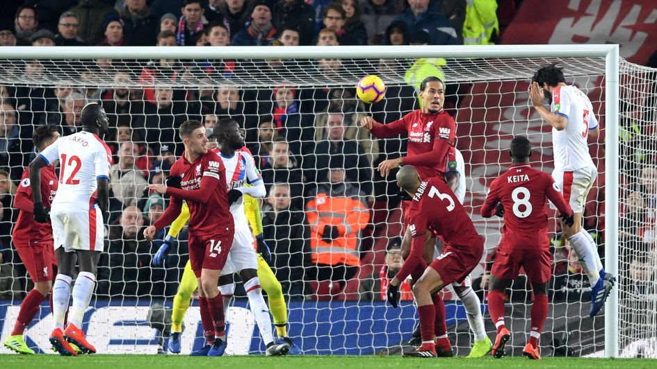 Crystal Palace's James Tomkins scores against Liverpool