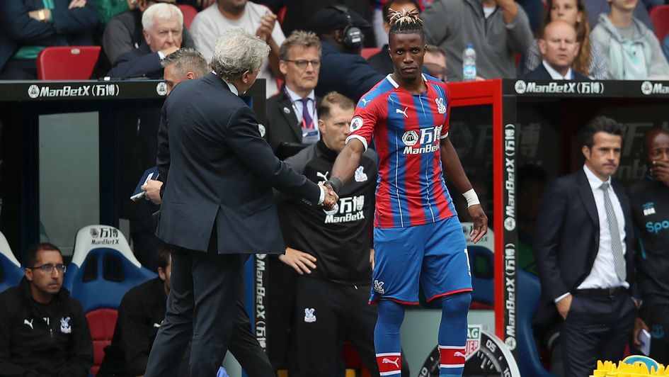 Roy Hodgson shakes hands with Wilfried Zaha before the Crystal Palace forward's cameo against Everton