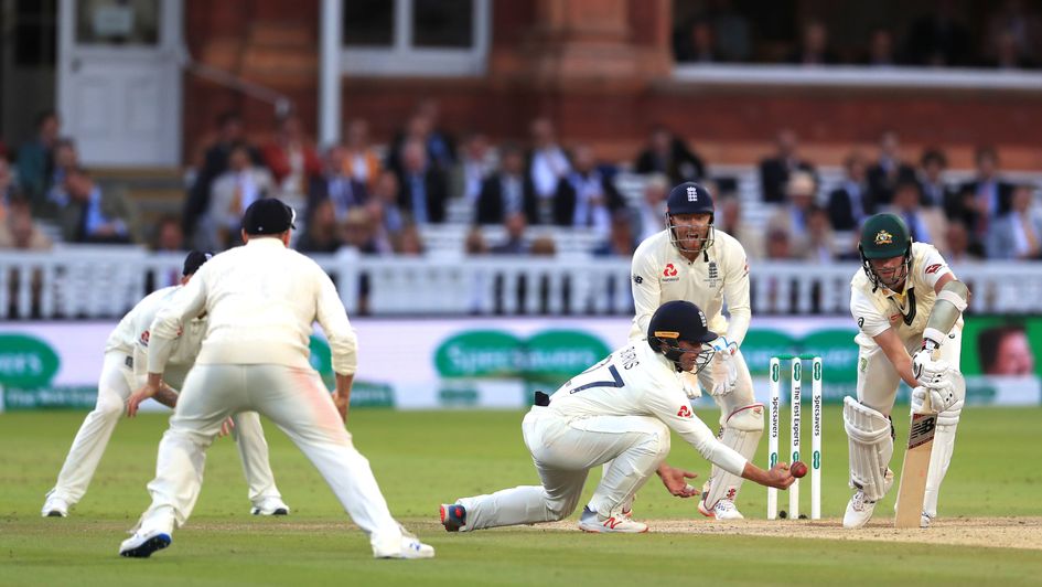 England's Rory Burns can't quite cling on to a catch as Australia hold firm