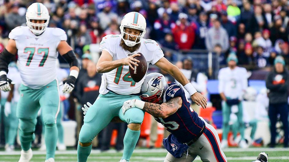 Ryan Fitzpatrick of the Miami Dolphins playing against the New England Patriots