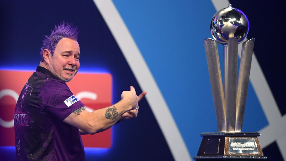 Peter Wright celebrates becoming world champion with his family