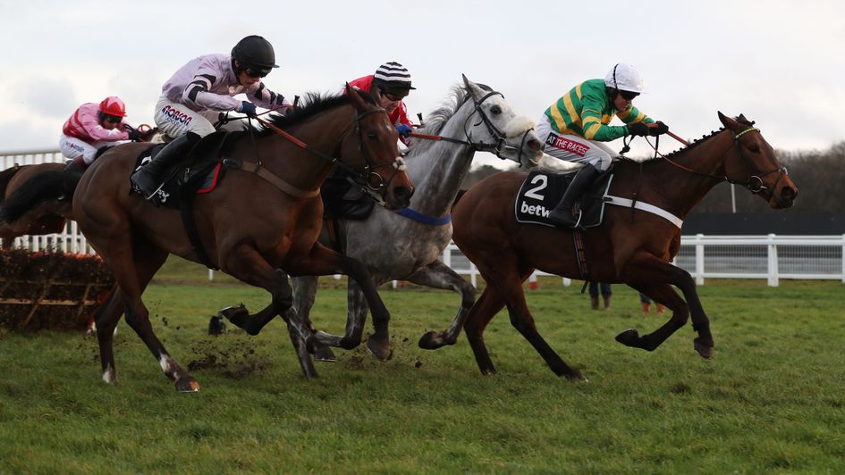 Getaway Trump (nearside) chasing home Champ
