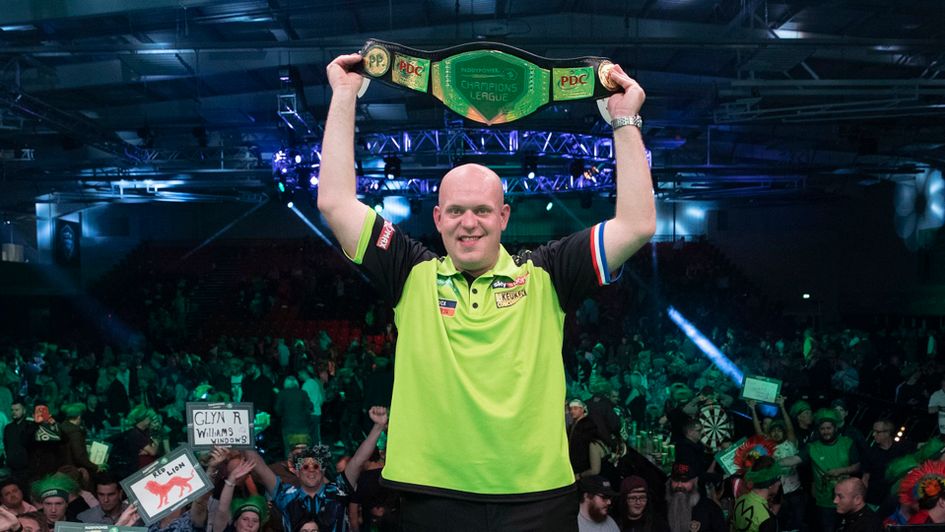 Michael van Gerwen holds the Champions League of Darts belt (Picture: Lawrence Lustig/PDC)