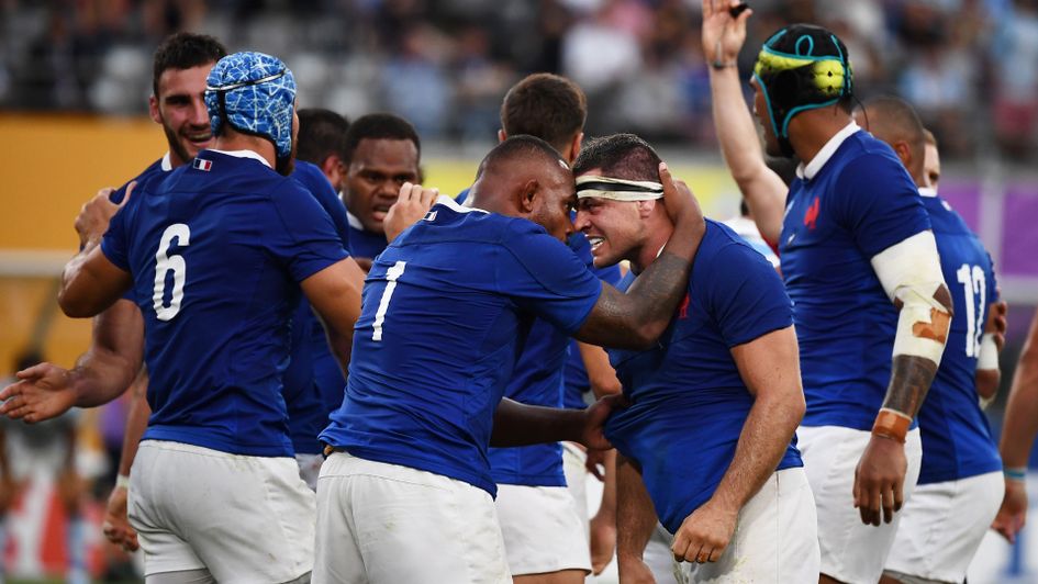 France's prop Jefferson Poirot (left) and hooker Guilhem Guirado celebrate