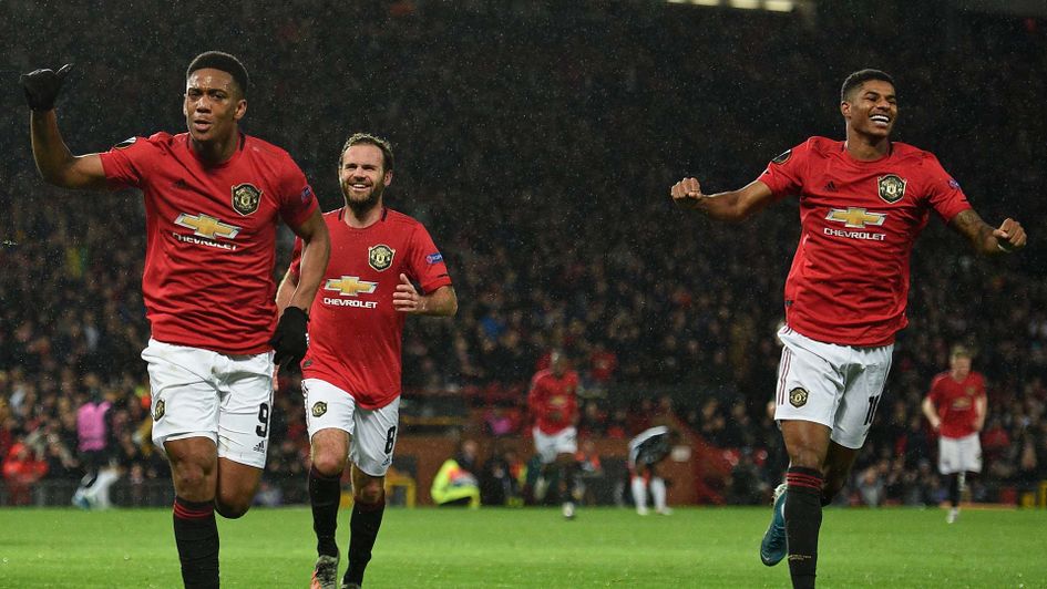Anthony Martial and Marcus Rashford celebrate Manchester United beating Partizan Belgrade