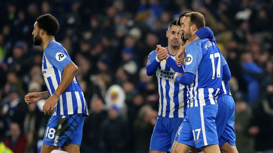 Glenn Murray is congratulated by his team-mates