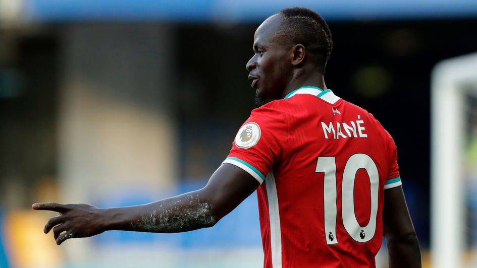 Sadio Mane celebrates scoring his second goal for Liverpool at Chelsea