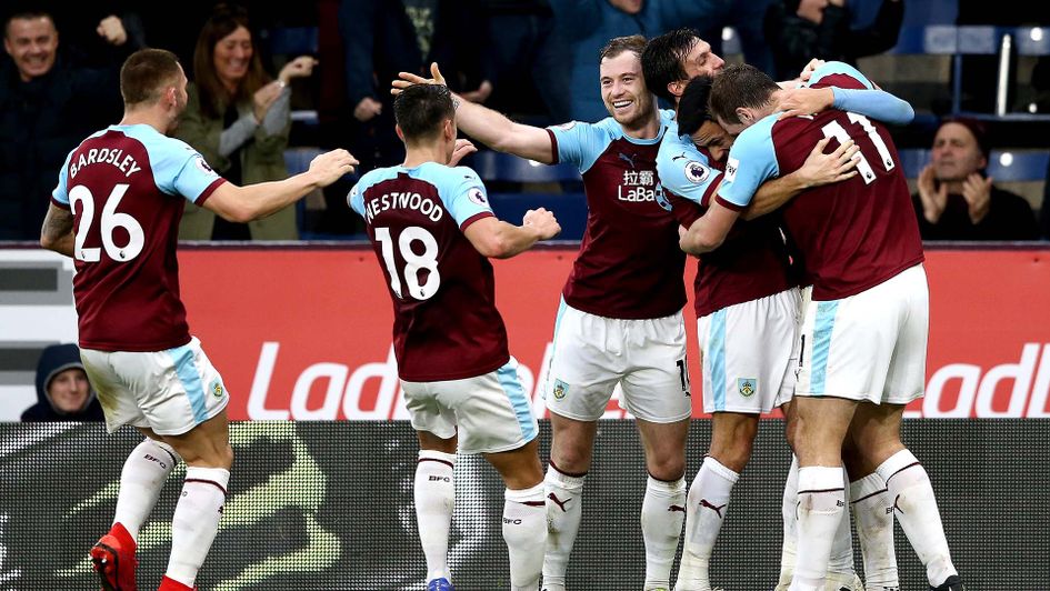 Burnley celebrate scoring a goal against West Ham